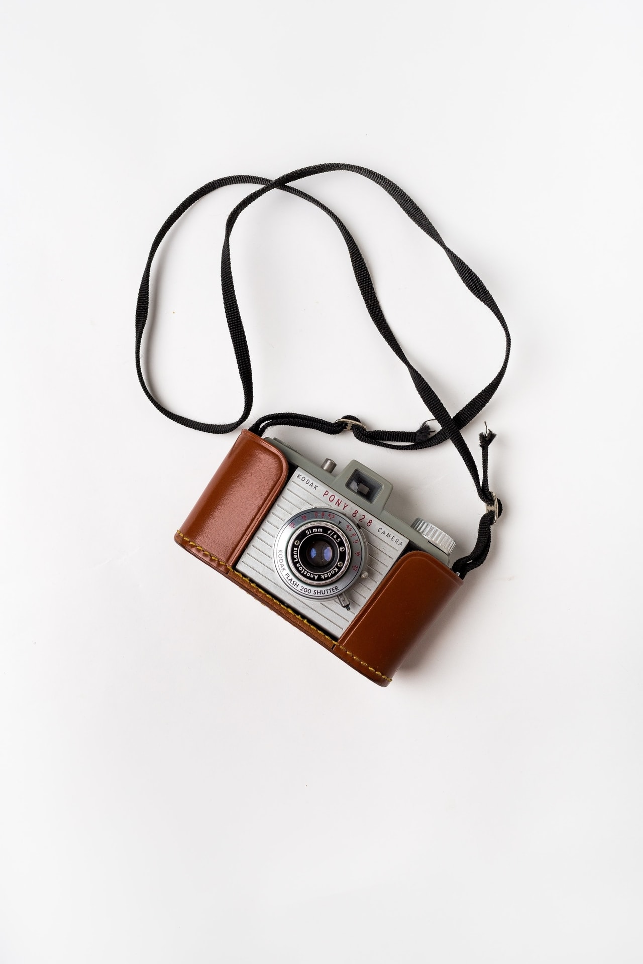 Camera Vintage kodak photo camera with leather sheath and strap